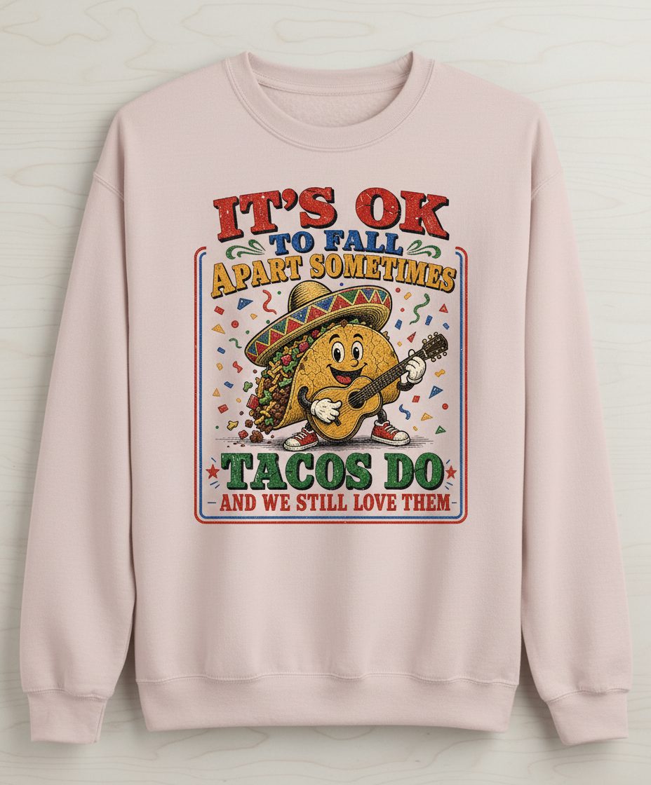 IT'S OK TO FALL APART Sometimes TACOS DO AND WE STILL LOVE Sweatshirt - product mockup - Sand