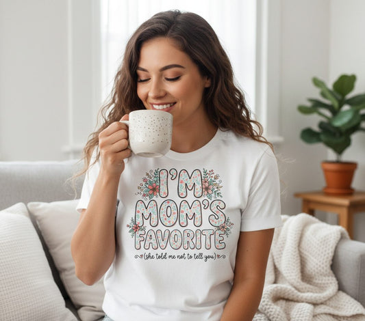 I'm Mom's Favorite (She Told Me Not to Tell You) sibling rivalry humor T-Shirt White lifestyle mockup