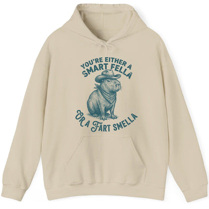You're Either a Smart Fella or a Fart Smella capybara Hoodie Sand product mockup