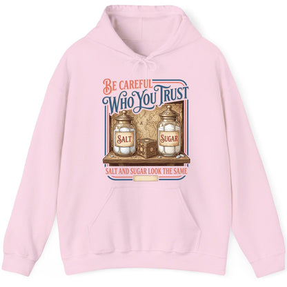 Be Careful Who You Trust Salt and Sugar Look the Same Hoodie - product mockup - Light Pink