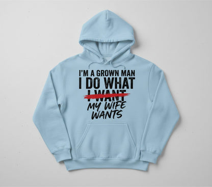 I'M a GROWN MAN I DO WHAT I WANT MY WIFE WANTS Funny Marriage Hoodie - product mockup - Light Blue