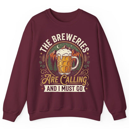 The Breweries Are Calling and I Must Go Funny Craft Beer Sweatshirt - product mockup - Maroon