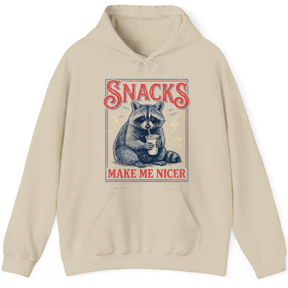 SNACKS MAKE ME NICER Funny Raccoon Hoodie - product mockup - Sand