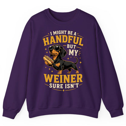I Might Be a Handful but My Weiner Sure Isn't dachshund Sweatshirt Purple product mockup