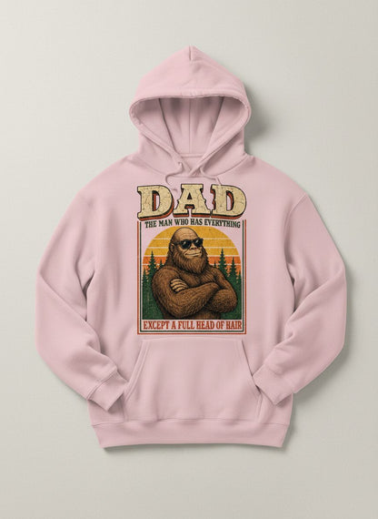 Dad the Man Who Has Everything Except a Full Head of Hair Funny Bigfoot Hoodie - product mockup - Light Pink