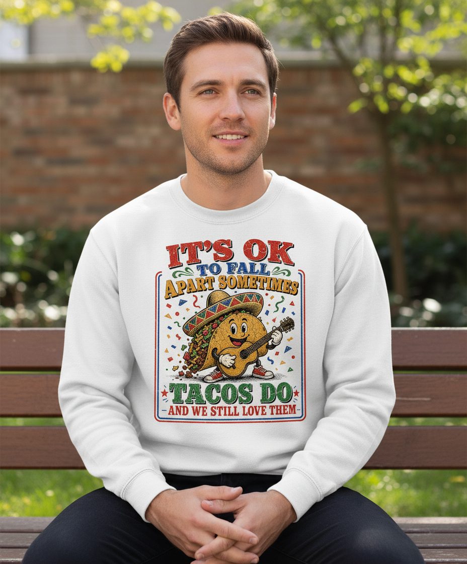 IT'S OK TO FALL APART Sometimes TACOS DO AND WE STILL LOVE Sweatshirt - lifestyle model mockup - White