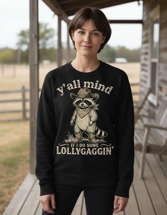 Y'all Mind IF I DO SOME Lollygagging' Funny Cowboy Raccoon Sweatshirt - lifestyle model mockup - Black