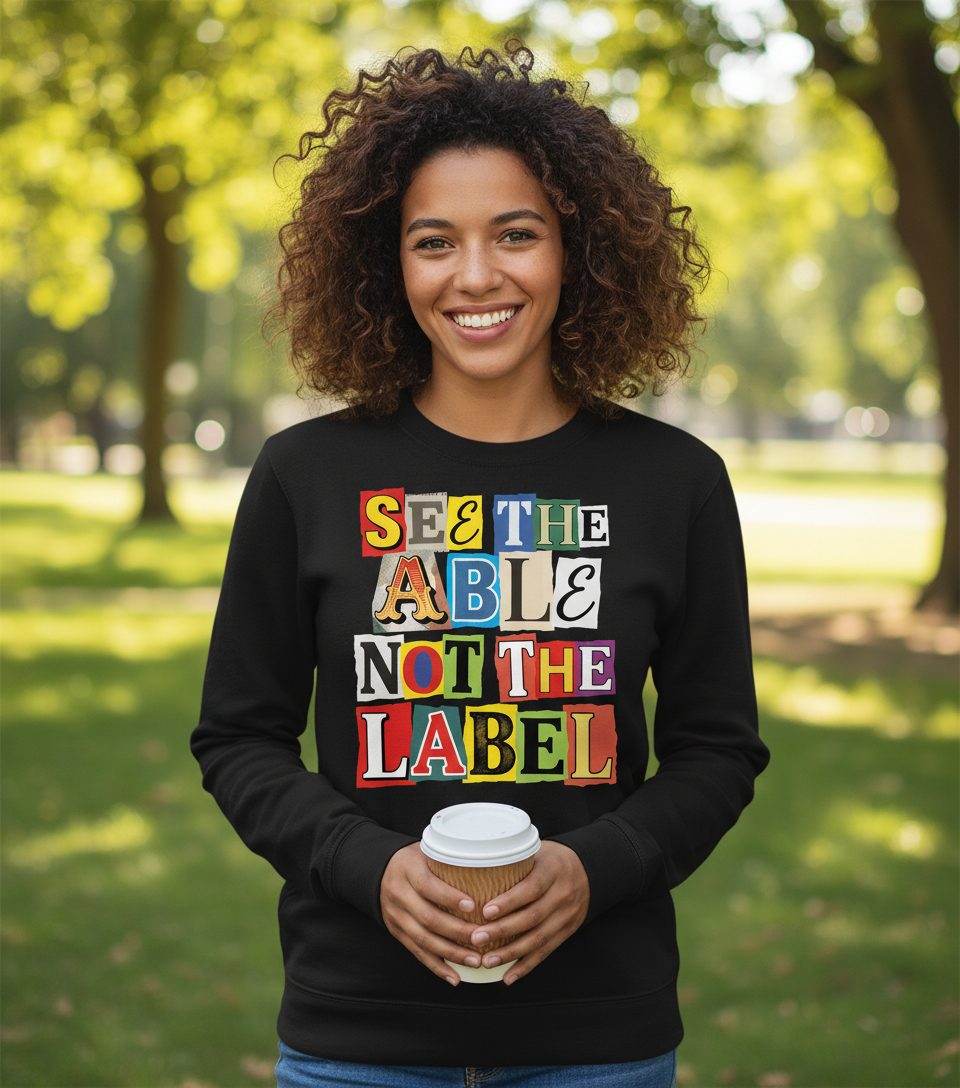 SEE THE ABLE NOT THE LABEL Inclusion and Awareness Sweatshirt - lifestyle model mockup - Black