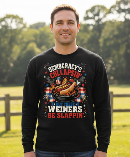 Democracy's Collapsin' but These Weiners Be Slappin' Sweatshirt - lifestyle model mockup - Black