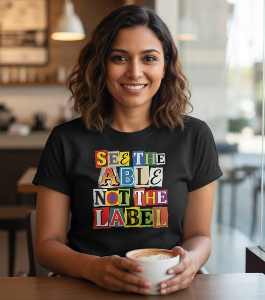 SEE THE ABLE NOT THE LABEL Inclusion and Awareness T-Shirt - lifestyle model mockup - Black