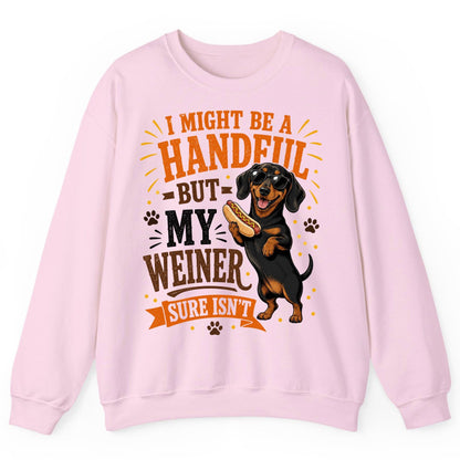 I Might Be a Handful but My Weiner Sure Isn't dachshund Sweatshirt Light Pink product mockup