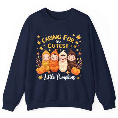 Caring for the Cutest Little Pumpkins swaddled babies Sweatshirt Navy product mockup