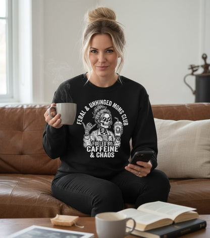 FERAL & Unhinged MOMS CLUB FUELED BY Caffeine & CHAOS Sweatshirt - lifestyle model mockup - Black