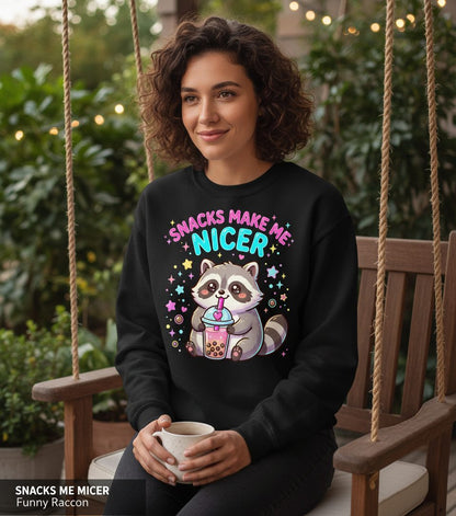 SNACKS MAKE ME NICER Funny Raccoon Sweatshirt - lifestyle model mockup - Black