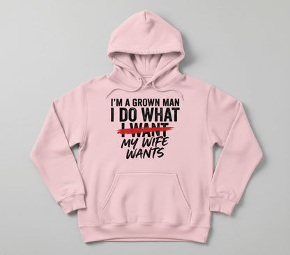 I'M a GROWN MAN I DO WHAT I WANT MY WIFE WANTS Funny Marriage Hoodie - product mockup - Light Pink