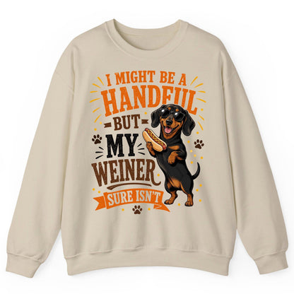 I Might Be a Handful but My Weiner Sure Isn't dachshund Sweatshirt Sand product mockup