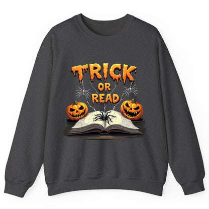 Trick or Read Halloween reading Sweatshirt Dark Heather product mockup
