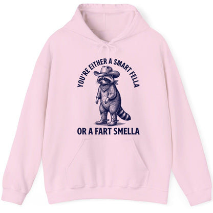 You're Either a Smart Fella or a Fart Smella cowboy raccoon Hoodie Light Pink product mockup