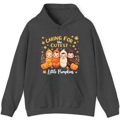 Caring for the Cutest Little Pumpkins swaddled babies Hoodie Dark Heather product mockup
