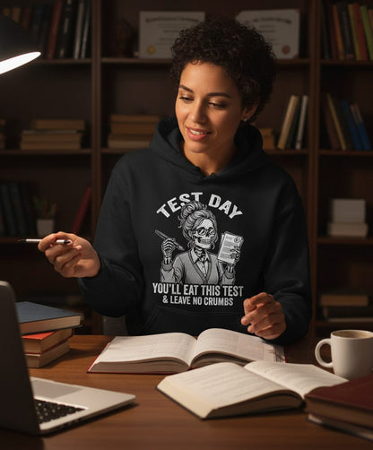 You'll Eat This Test & Leave No Crumbs Funny Day Hoodie - lifestyle model mockup - Black