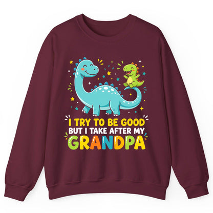 I TRY TO BE GOOD BUT I TAKE AFTER MY Grandpa Funny Dinosaur Sweatshirt - product mockup - Maroon