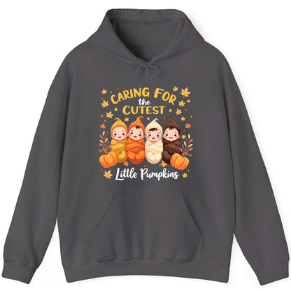 Caring for the Cutest Little Pumpkins swaddled babies Hoodie Charcoal product mockup