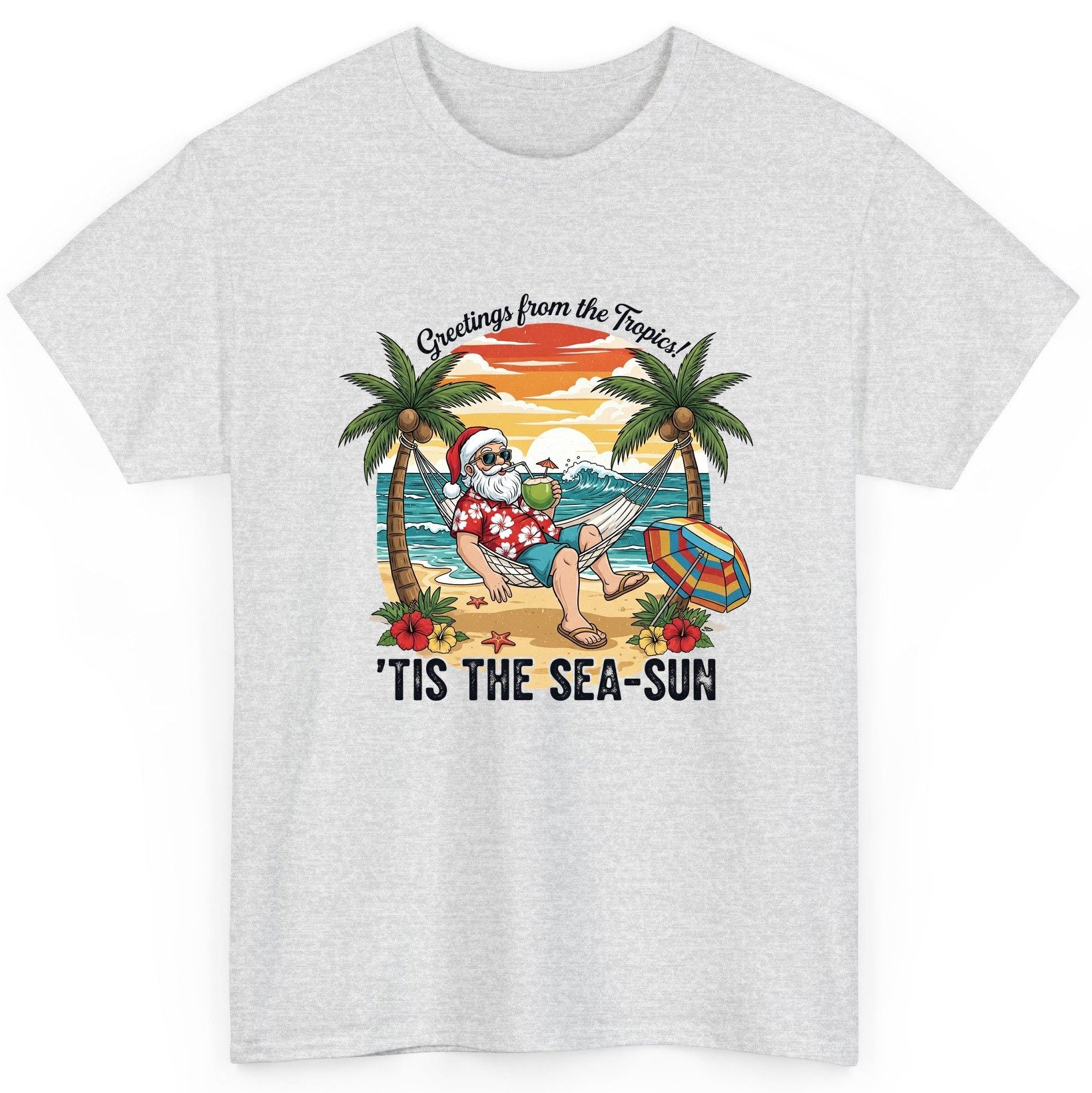 Greetings from the Tropics 'Tis the Sea-Sun santa claus on a tropical vacation T-Shirt Ash product mockup