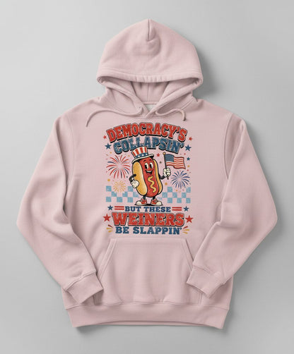 Democracy's Collapsin' but These Weiners Be Slappin' Funny 4th Hoodie - product mockup - Light Pink
