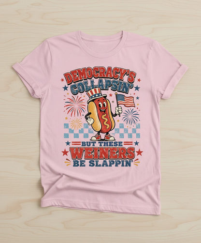 Democracy's Collapsin' but These Weiners Be Slappin' Funny 4th T-Shirt - product mockup - Light Pink