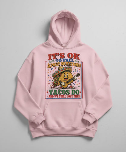 IT'S OK TO FALL APART Sometimes TACOS DO AND WE STILL LOVE THEM Hoodie - product mockup - Light Pink