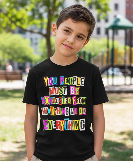 YOU PEOPLE MUST BE Exhausted FROM Watching ME DO Youth T-Shirt - lifestyle model mockup - Black