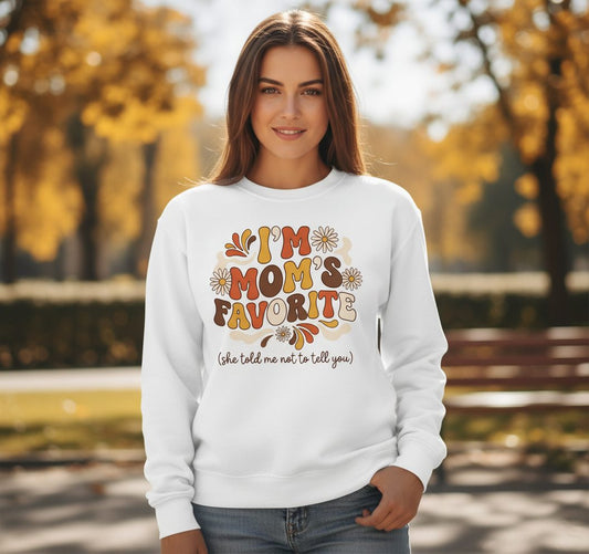 I'm Mom's Favorite (She Told Me Not to Tell You) favorite child Sweatshirt White lifestyle mockup