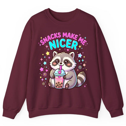 SNACKS MAKE ME NICER Funny Raccoon Sweatshirt - product mockup - Maroon