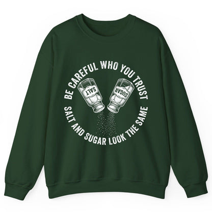 BE Careful WHO YOU TRUST SALT AND SUGAR LOOK THE SAME Sweatshirt - product mockup - Forest Green