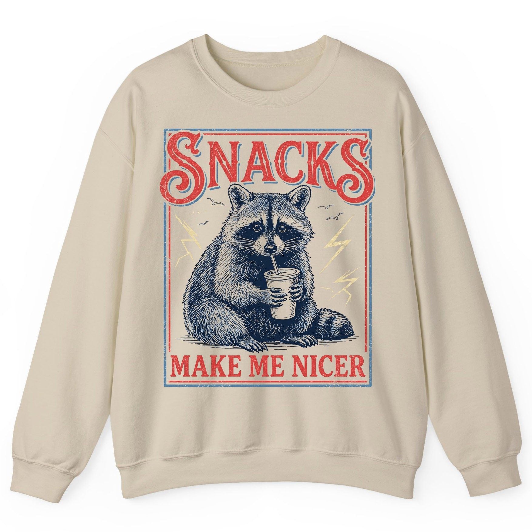 SNACKS MAKE ME NICER Funny Raccoon Sweatshirt - product mockup - Sand