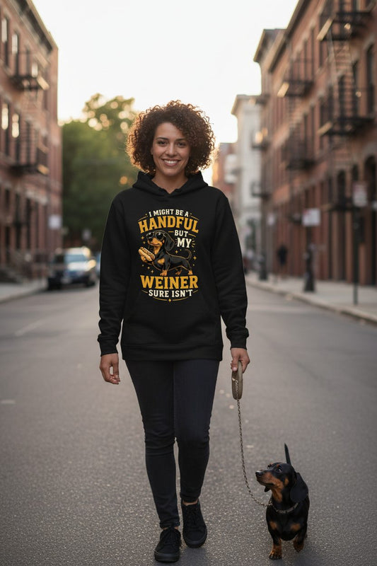 I Might Be a Handful but My Weiner Sure Isn't dachshund Hoodie Black lifestyle mockup