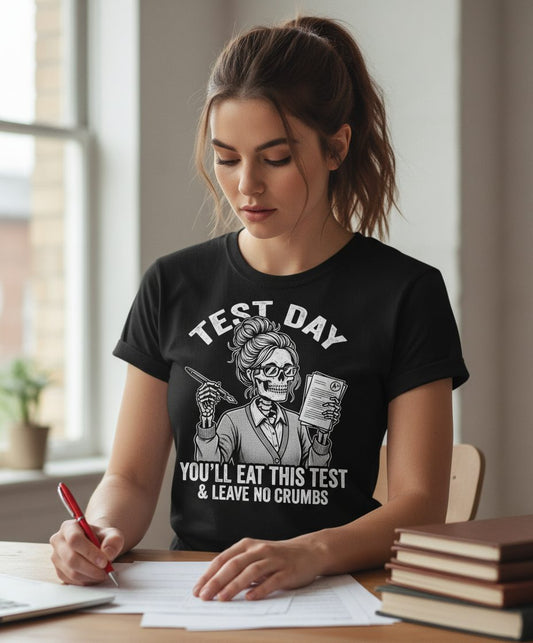 You'll Eat This Test & Leave No Crumbs Funny Day T-Shirt - lifestyle model mockup - Black