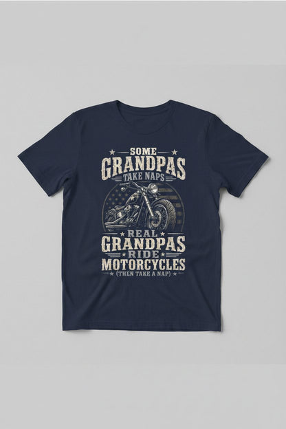 Some Grandpas Take Naps Real Grandpas Ride Motorcycles (then Take a Nap) Funny Detailed Illustration of Classic Motorcycle with Distressed Texture in the Background Is Subtle Weathered American Flag Pattern Stars and Stripes T-Shirt - product mockup - Navy