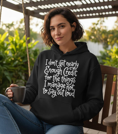 I Don't Get Nearly Enough Credit for the Things I Manage Not to Say Out Loud sarcastic humor Hoodie Black lifestyle mockup