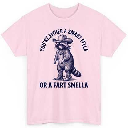 You're Either a Smart Fella or a Fart Smella cowboy raccoon T-Shirt Light Pink product mockup