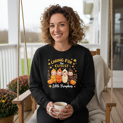 Caring for the Cutest Little Pumpkins swaddled babies Sweatshirt Black lifestyle mockup