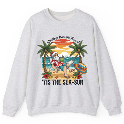 Greetings from the Tropics 'Tis the Sea-Sun santa claus on a tropical vacation Sweatshirt Ash product mockup
